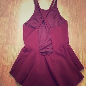 Peplum top with criss cross back